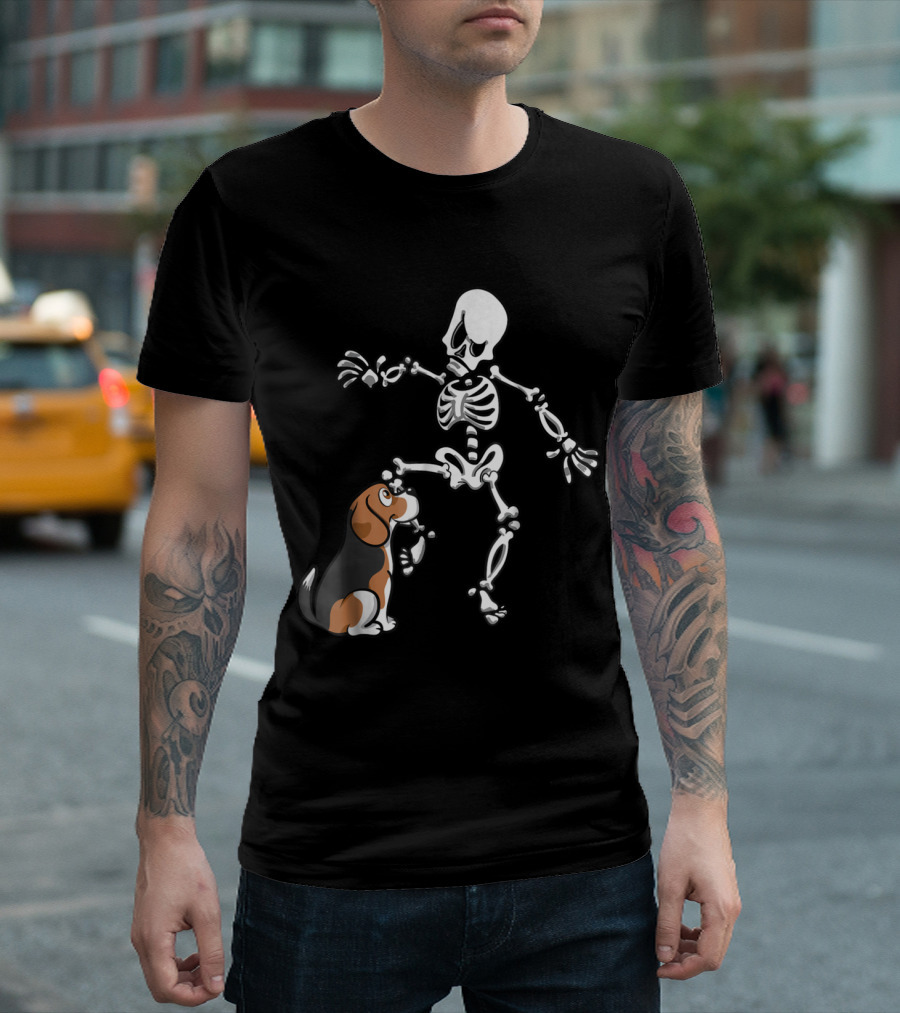 Beagle Playfully Biting Skeleton's Leg In Humorous Halloween Scene T-Shirt