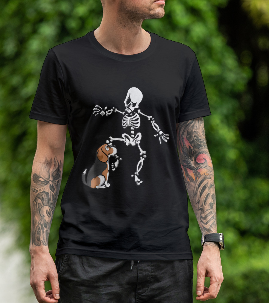 Beagle Playfully Biting Skeleton's Leg In Humorous Halloween Scene T-Shirt