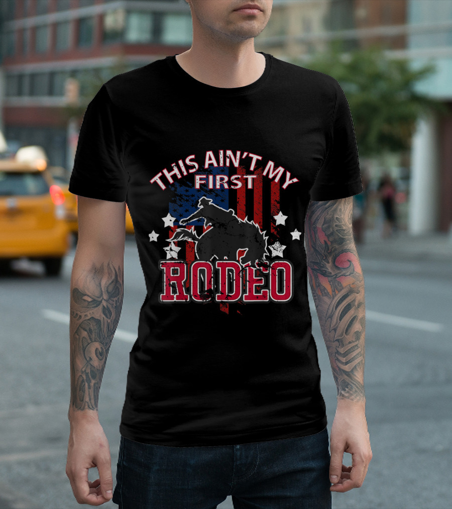 This Ain’t My First Rodeo Patriotic Cowboys American Flag Bull Rider T-Shirt