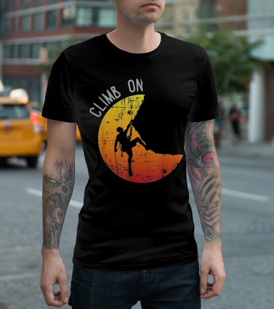 Climb On Rock Mountain Climbing Silhouette against Distressed Yellow and Orange Suns Background T-Shirt