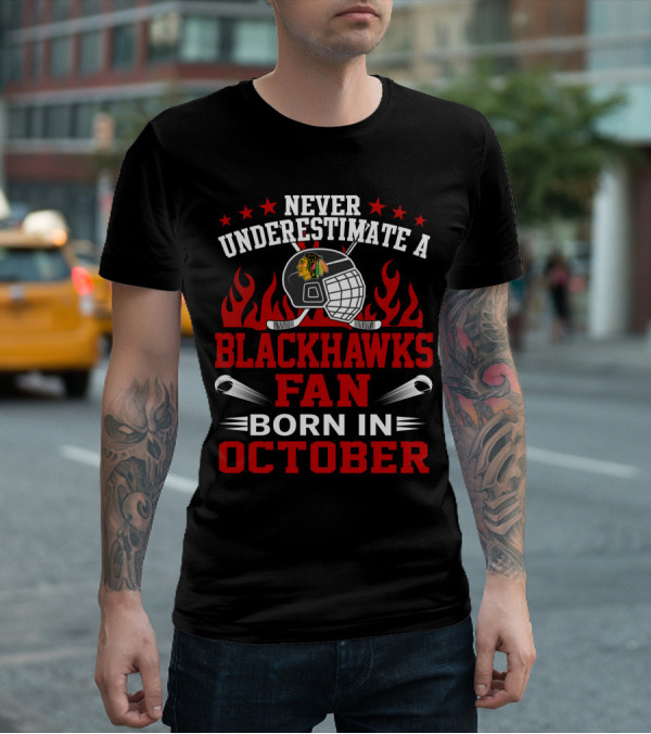 Never Underestimate A Blackhawks Fan Born In October Helmet And Flames Highlighted T-Shirt