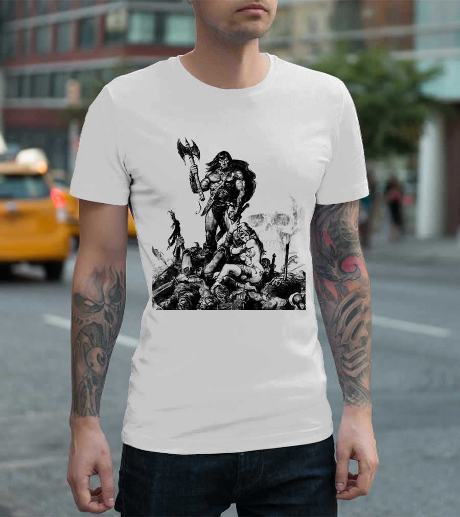 Conan Barbarian Warrior Standing on Battlefield with Axe and Skull in Background T-Shirt