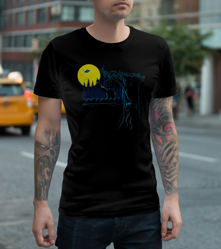 Alien Toy and Child Pointing at UFO by Moonlit Fence T-Shirt