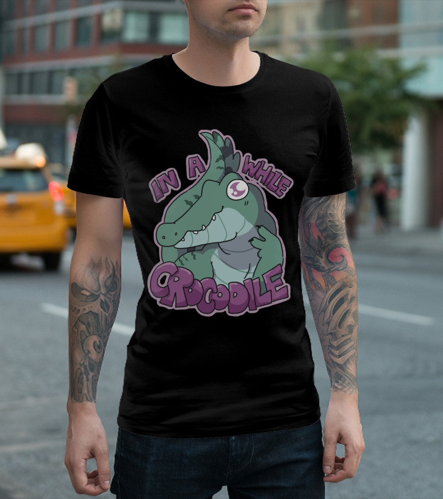 In A While Crocodile Cartoon Illustration With Playful Text T-Shirt