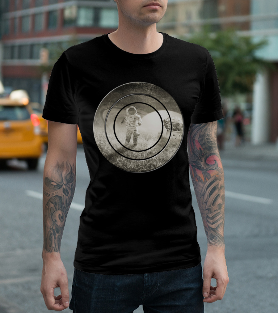 Astronaut on Grassy Field with Spacecraft in Background T-Shirt