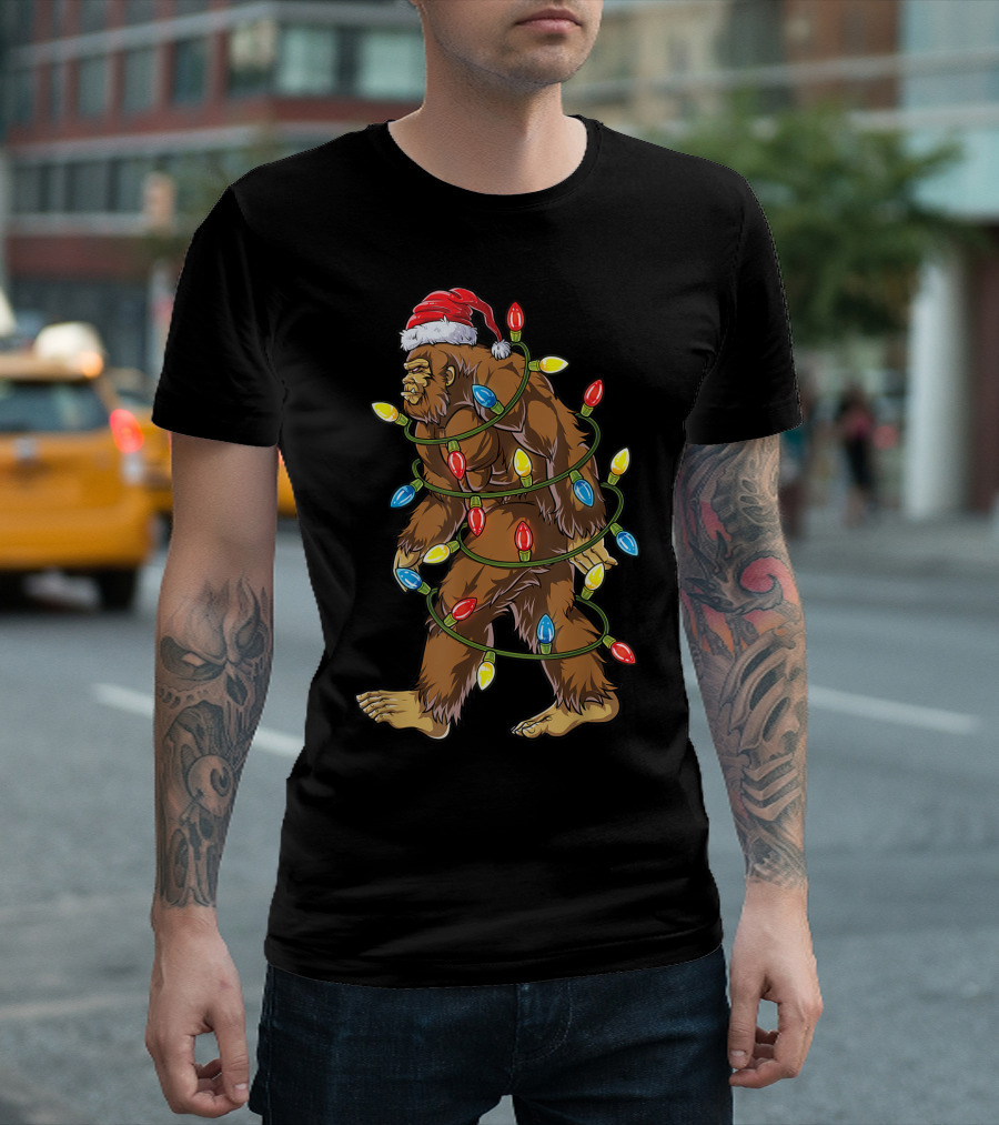 Bigfoot in Santa Hat Wrapped in Christmas Tree Lights T-Shirt