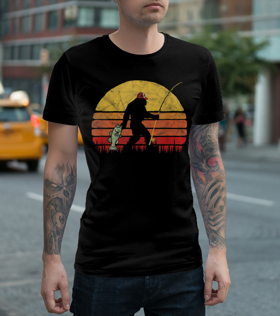 Bass Fishing Bigfoot Silhouette In Trucker Hat With Sunset Background T-Shirt