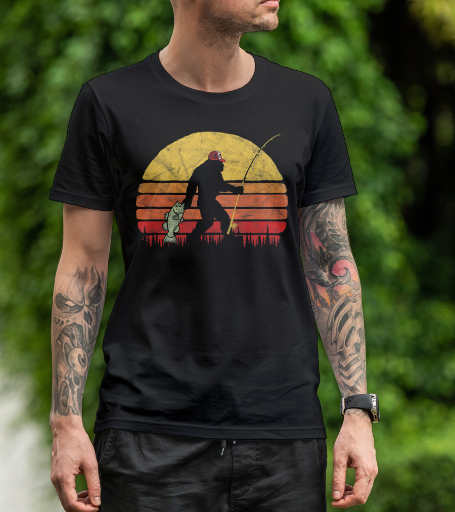 Bass Fishing Bigfoot Silhouette In Trucker Hat With Sunset Background T-Shirt