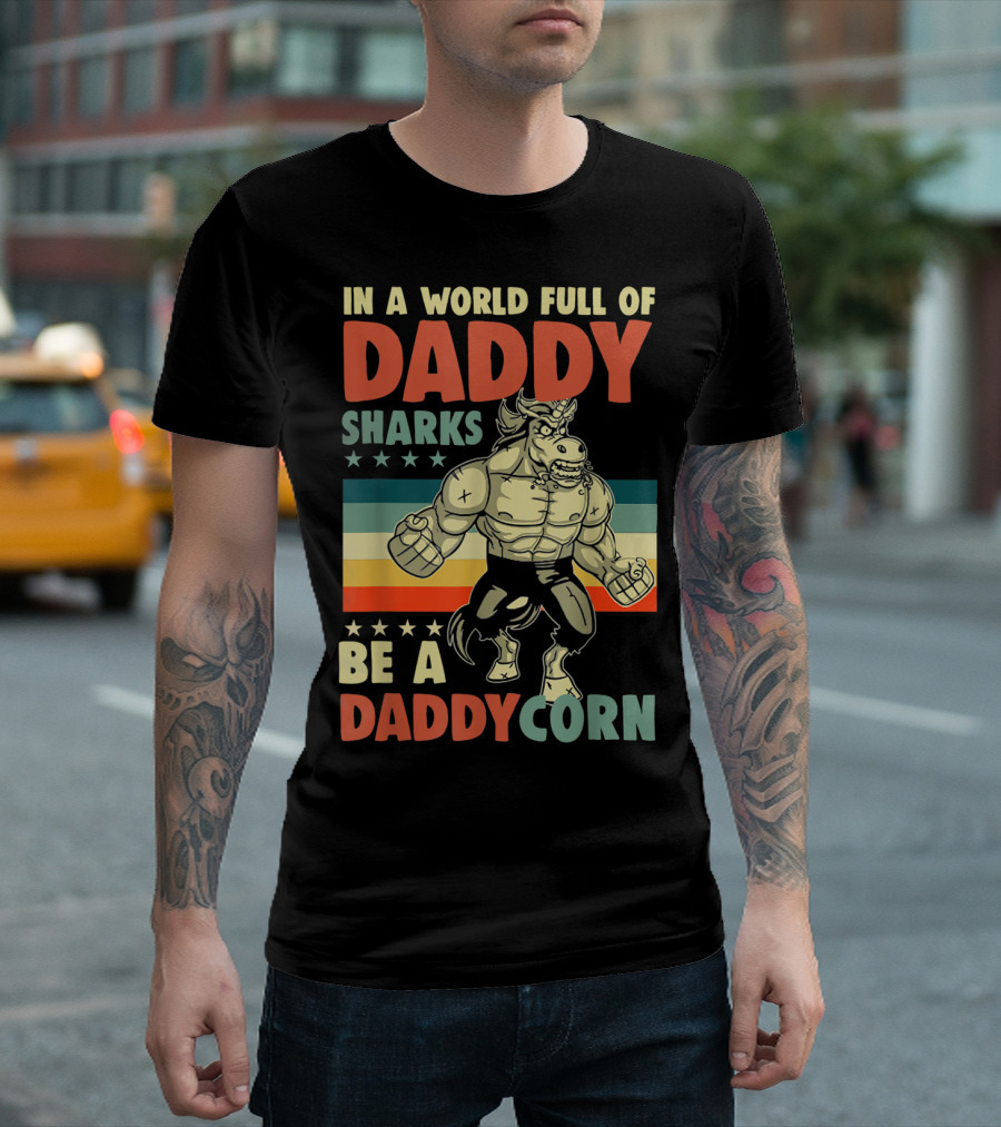 In A World Full Of Daddy Sharks Be A Daddycorn With Muscle Unicorn Superhero On Striped Starry Background T-Shirt