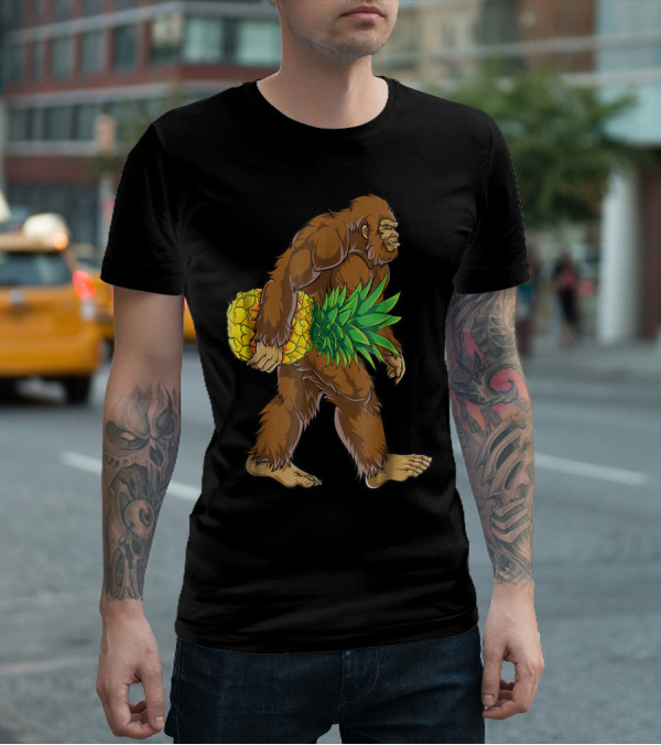 Bigfoot Carrying Pineapple Funny Sasquatch Iconic Creature Humor T-Shirt