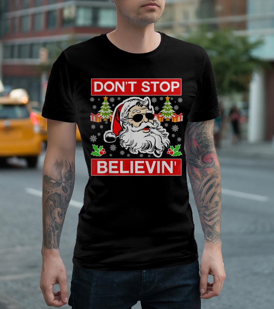 DON'T STOP BELIEVIN' Santa Christmas Trees Presents Snowflakes T-Shirt