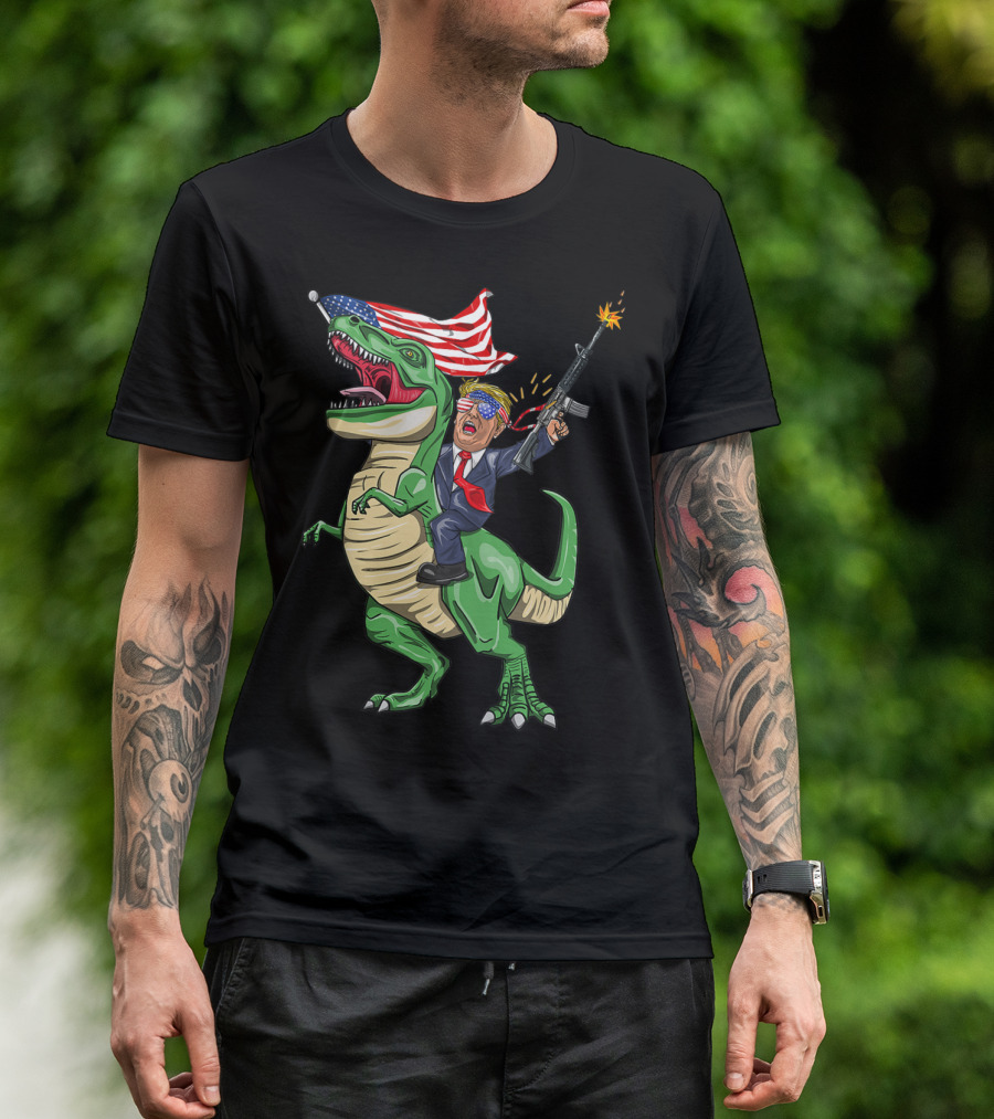 Machine Gun Trump Riding T-Rex With American Flag T-Shirt