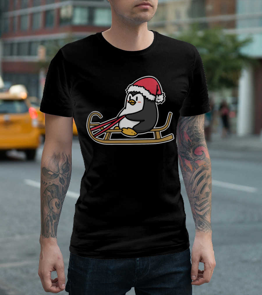 Penguin Sledding Santa Hat Winter Fun T-Shirt