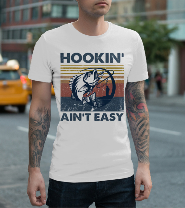 Hookin' Ain't Easy Vintage Fishing Graphic With Striped Sunset And Angler T-Shirt