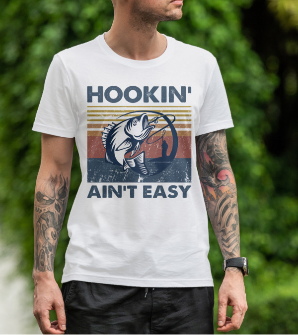 Hookin' Ain't Easy Vintage Fishing Graphic With Striped Sunset And Angler T-Shirt