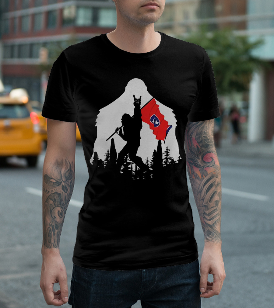 Bigfoot Silhouette with Rock and Roll Pose Holding Tennessee Flag in Forest T-Shirt