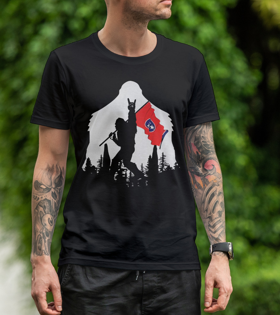 Bigfoot Silhouette With Rock And Roll Pose Holding Tennessee Flag In Forest T-Shirt