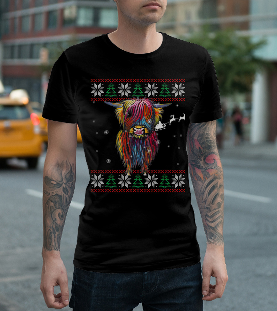 Festive Rainbow Highland Cow With Santa Sleigh And Snowflakes Christmas T-Shirt