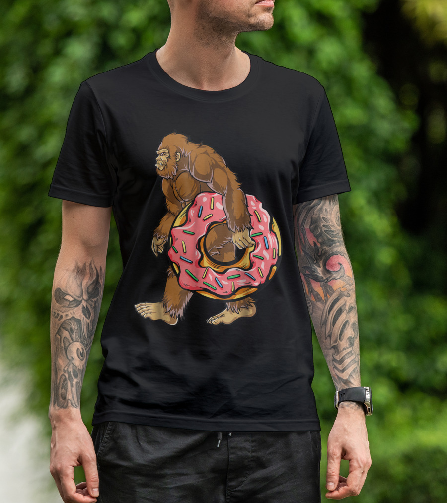 Bigfoot Sasquatch With Pink Sprinkle Donut For Women And Kids T-Shirt