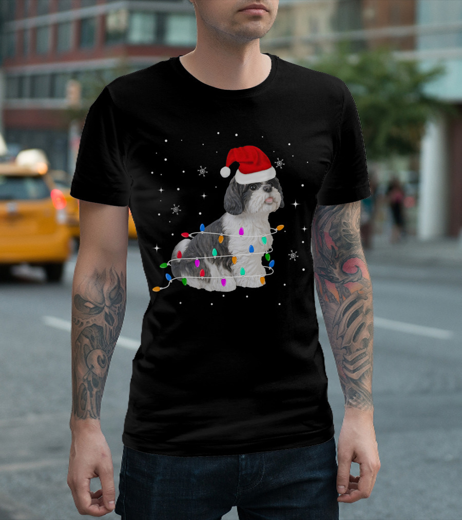 Shih Tzu Wrapped In Christmas Lights With Santa Hat And Snowflakes T-Shirt