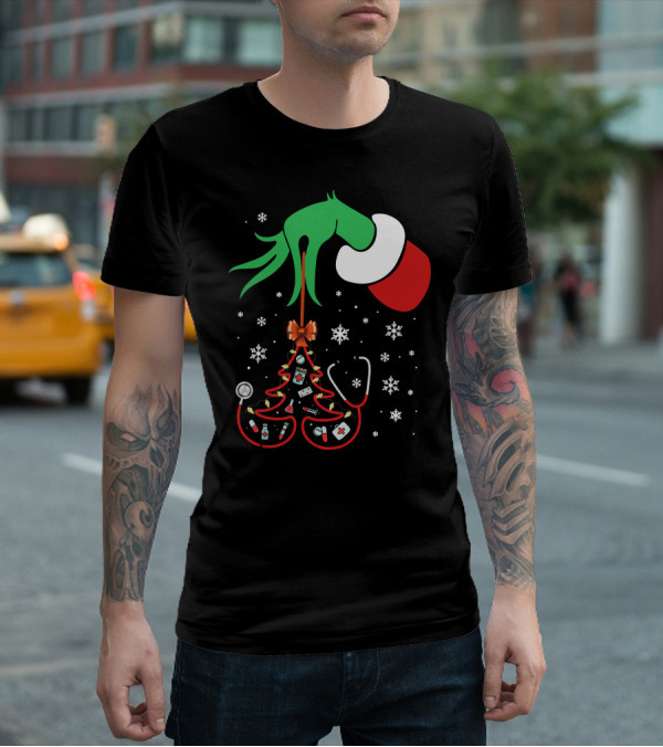 Grinch Hand Holding Nurse Themed Christmas Tree With Medical Icons T-Shirt