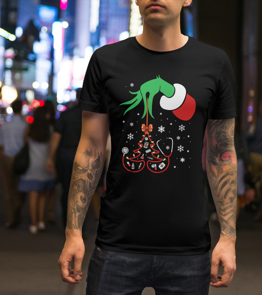 Grinch Hand Holding Nurse Themed Christmas Tree With Medical Icons T-Shirt