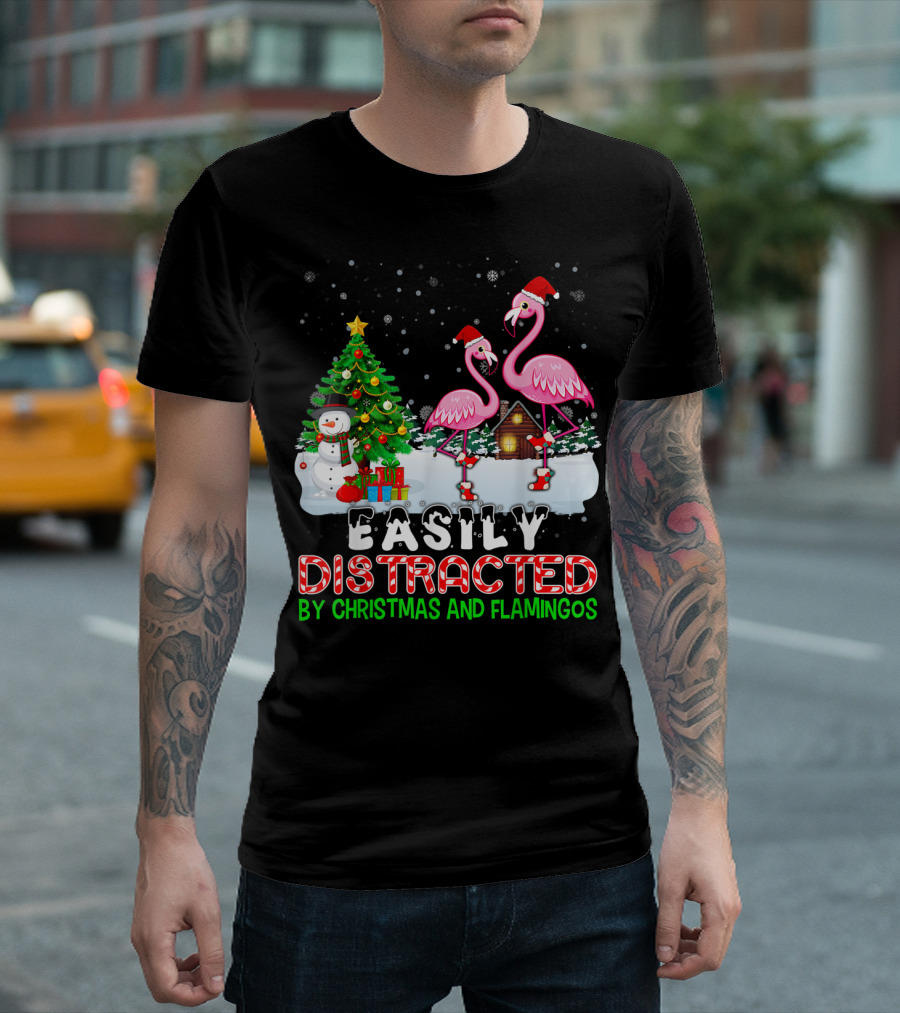 Easily Distracted By Christmas And Flamingos With Santa Hats In Snow Scene With Tree And Snowman T-Shirt
