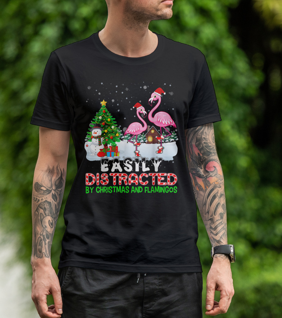 Easily Distracted By Christmas And Flamingos With Santa Hats In Snow Scene With Tree And Snowman T-Shirt