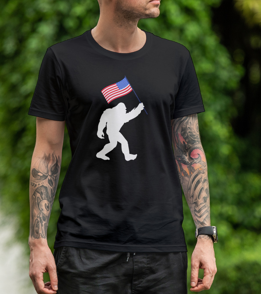 Funny Bigfoot Carrying American Flag For 4th Of July Celebrations T-Shirt