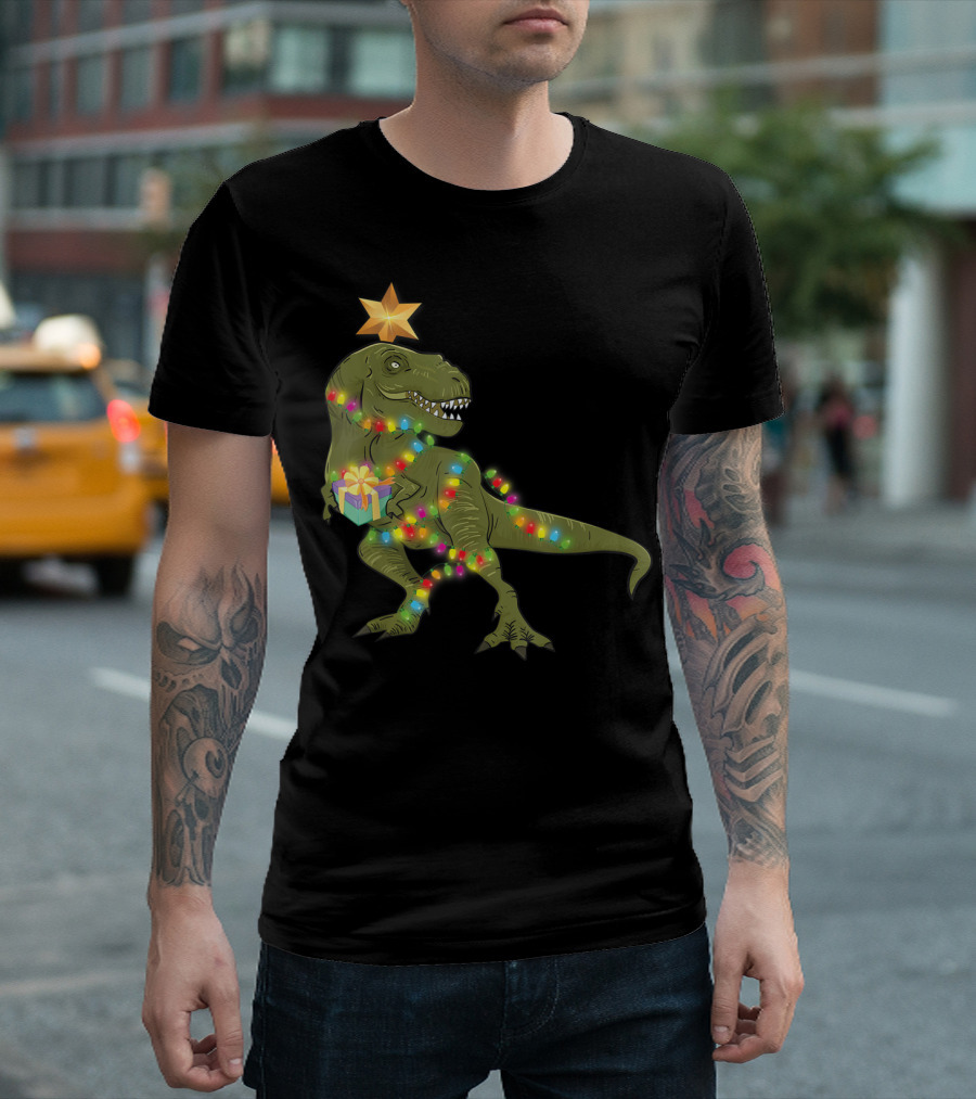 Ugly Christmas With T-Rex Wrapped in Colorful Lights Holding Gift T-Shirt