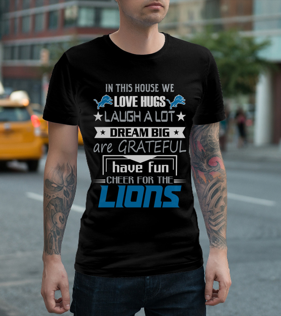 In This House We Love Hugs Laugh A Lot Dream Big Are Grateful Have Fun Cheer For The Lions T-Shirt
