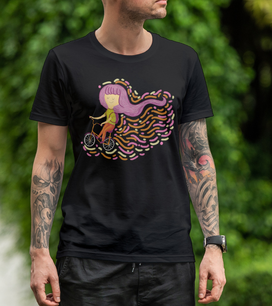 Claire Riding Bicycle With Flowing Pink Hair And Colorful Trails T-Shirt