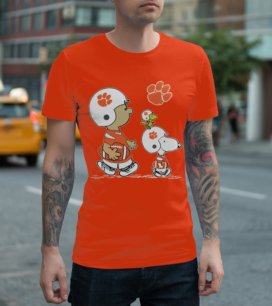 Clemson Tigers Snoopy Football Helmets And Paw Print Charlie Brown Woodstock T-Shirt