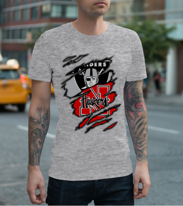 Raiders Huskers Torn Design With Icons And Symbols T-Shirt