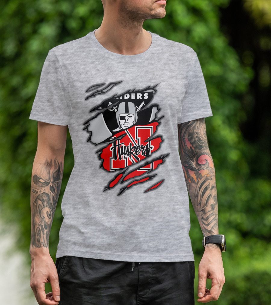 Raiders Huskers Torn Design With Icons And Symbols T-Shirt