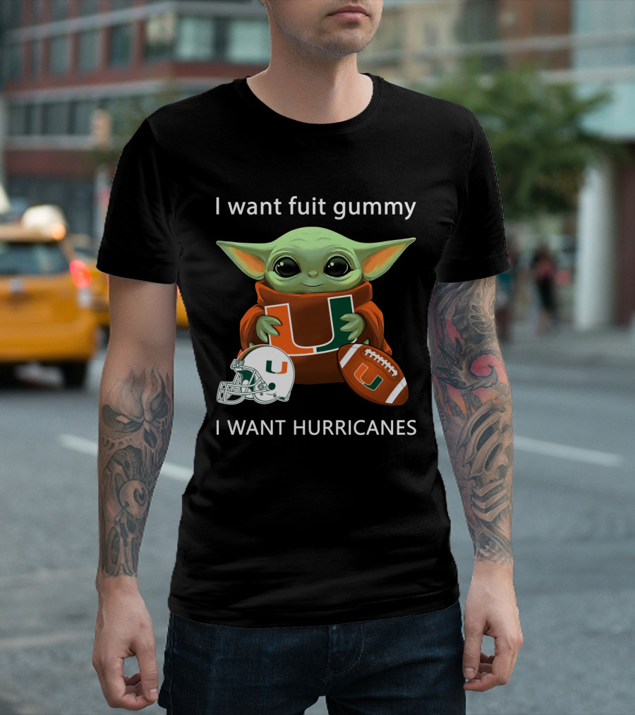 I Want Fuit Gummy I Want Hurricanes Baby Yoda Holding Miami Hurricanes Logo Helmet And Football T-Shirt