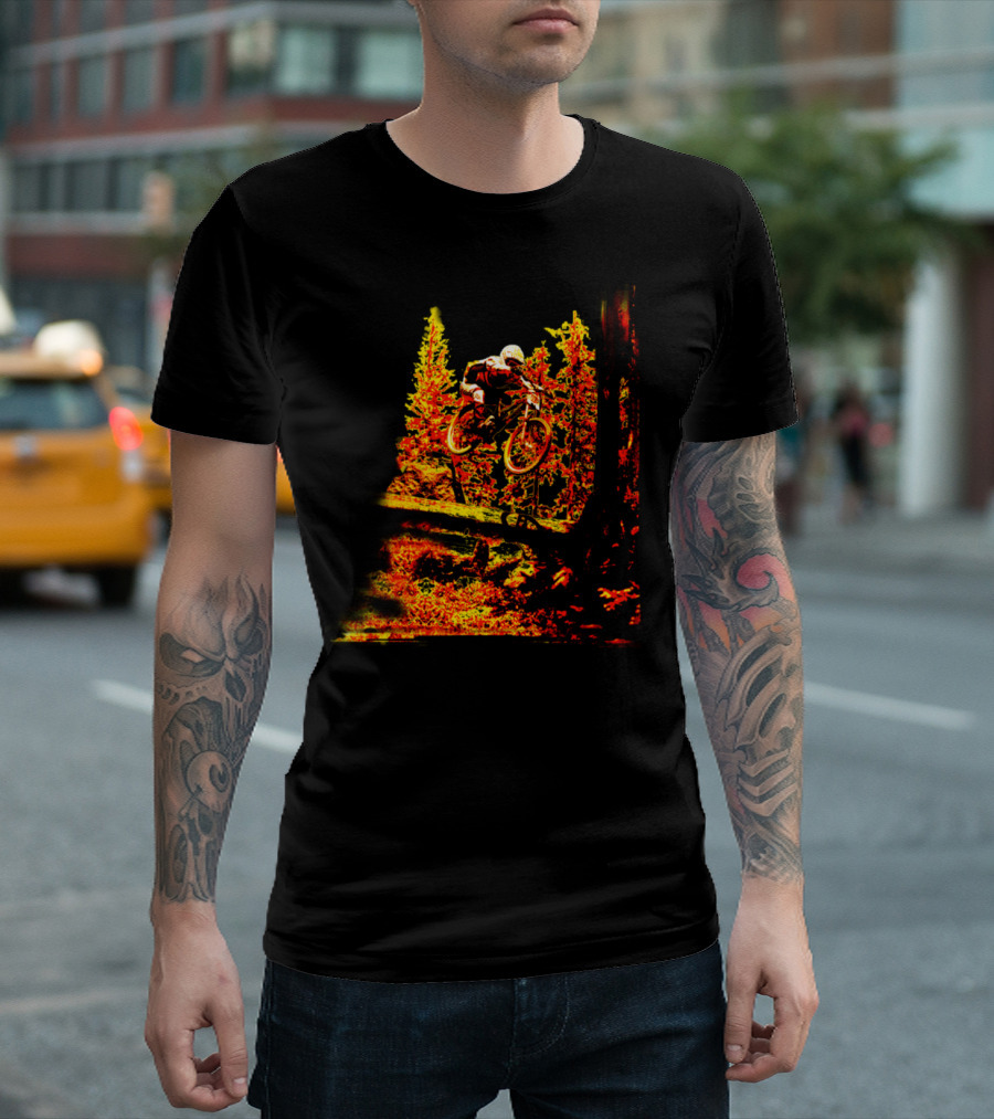 Mountain Bike Rider Jumping Over Log in Vibrant Forest Setting T-Shirt