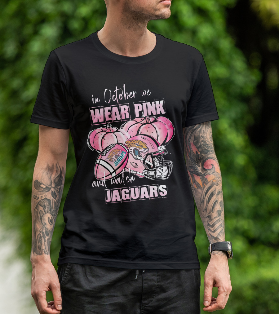 In October We Wear Pink And Watch Jaguars Football Helmet Pumpkins T-Shirt