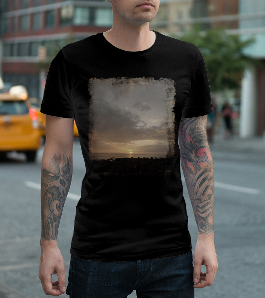 Serene Landscape Capturing Vibrant Clouds and Golden Horizon Over Distant Ocean T-Shirt