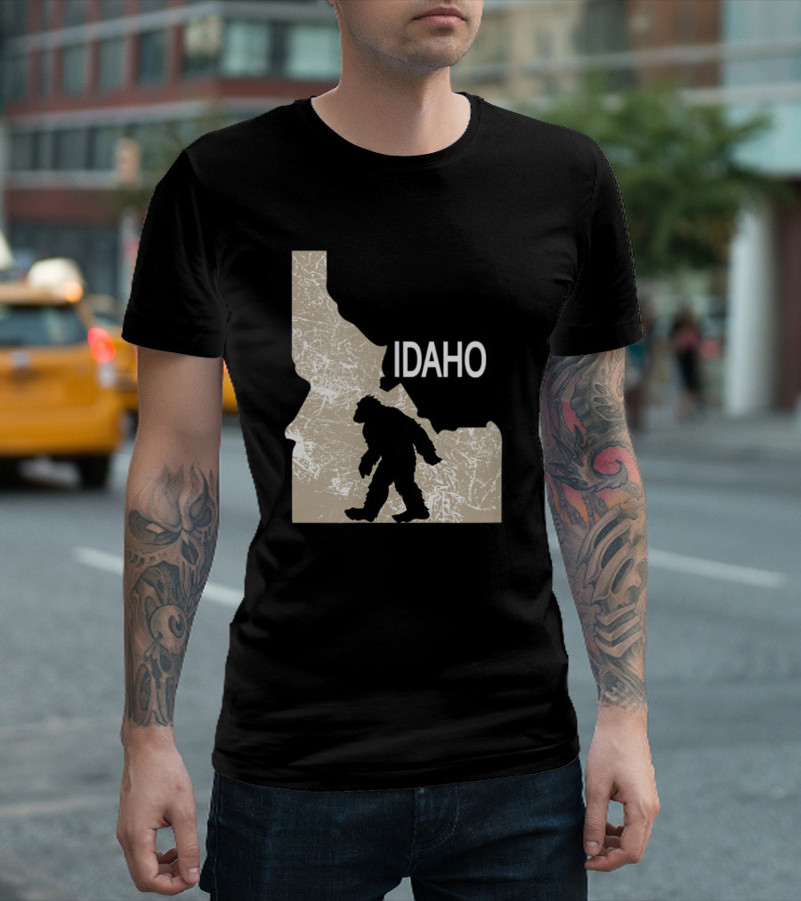 Funny Bigfoot Silhouette Walking in Idaho State Map I Believe Idaho Loves Bigfoot T-Shirt