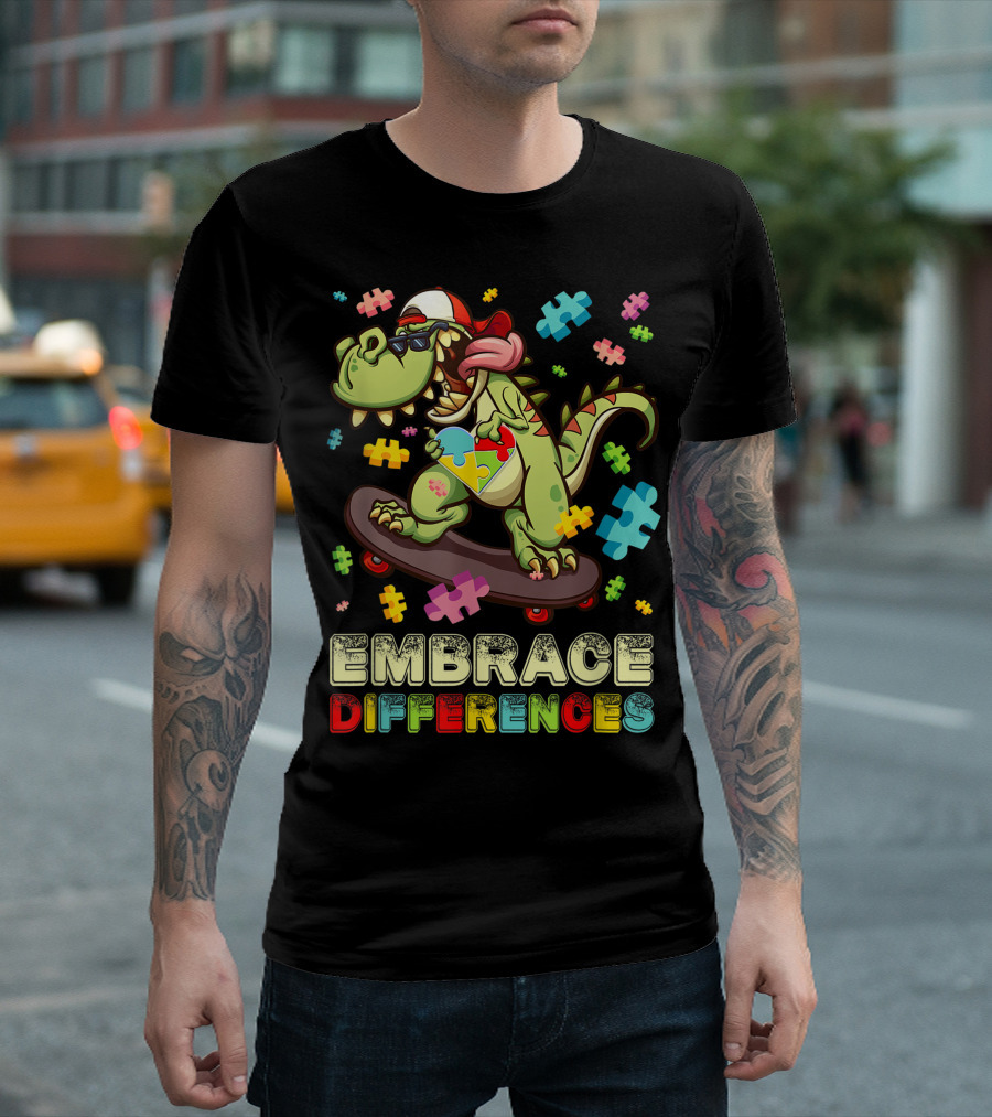 Embrace Differences Puzzle Pieces Dinosaur Skateboarding T-Shirt