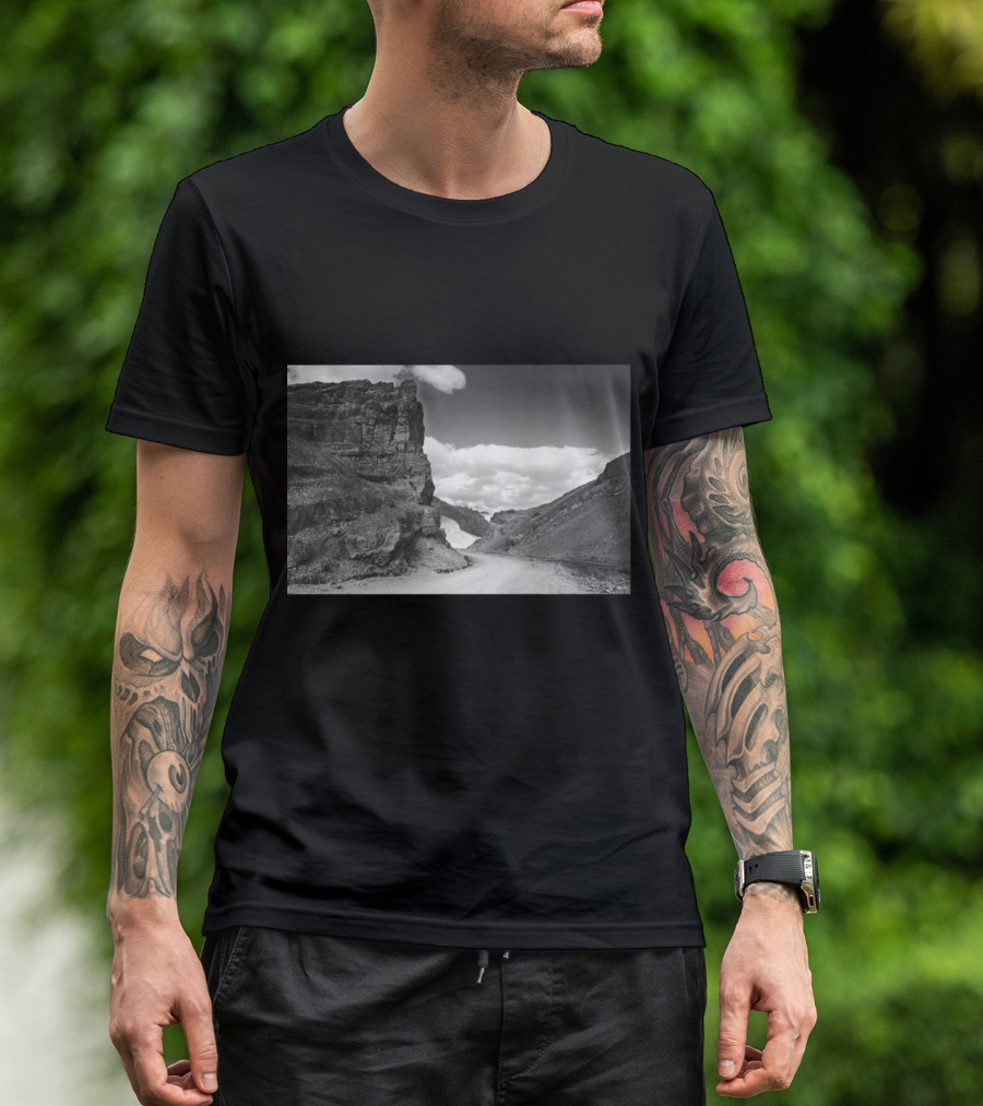 Pang Landscape Serene Mountainous Road Against Majestic Rock Formations And Cloud-Filled Sky T-Shirt