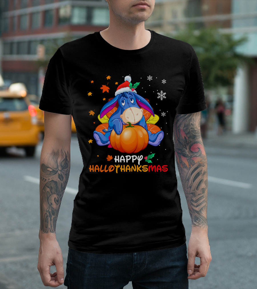 Eeyore Happy Hallothanksmas Sitting On Pumpkin With Santa Hat Snowflakes And Autumn Leaves T-Shirt