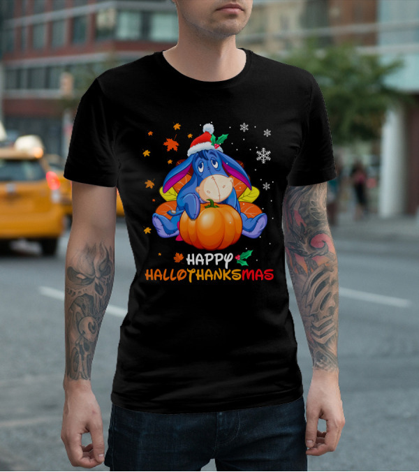 Eeyore Happy Hallothanksmas Sitting On Pumpkin With Santa Hat Snowflakes And Autumn Leaves T-Shirt