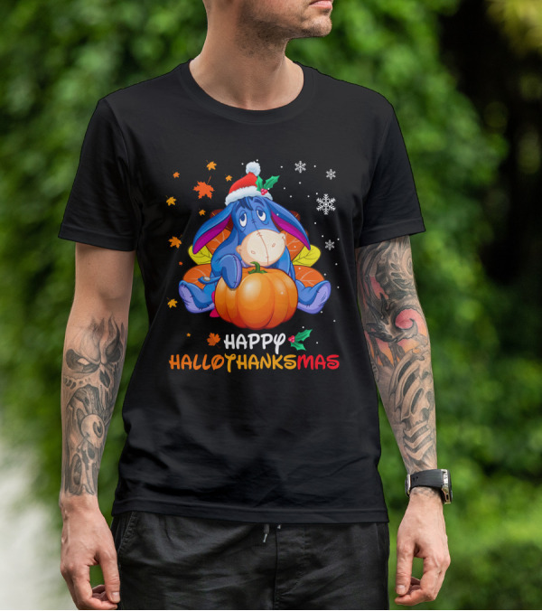 Eeyore Happy Hallothanksmas Sitting On Pumpkin With Santa Hat Snowflakes And Autumn Leaves T-Shirt