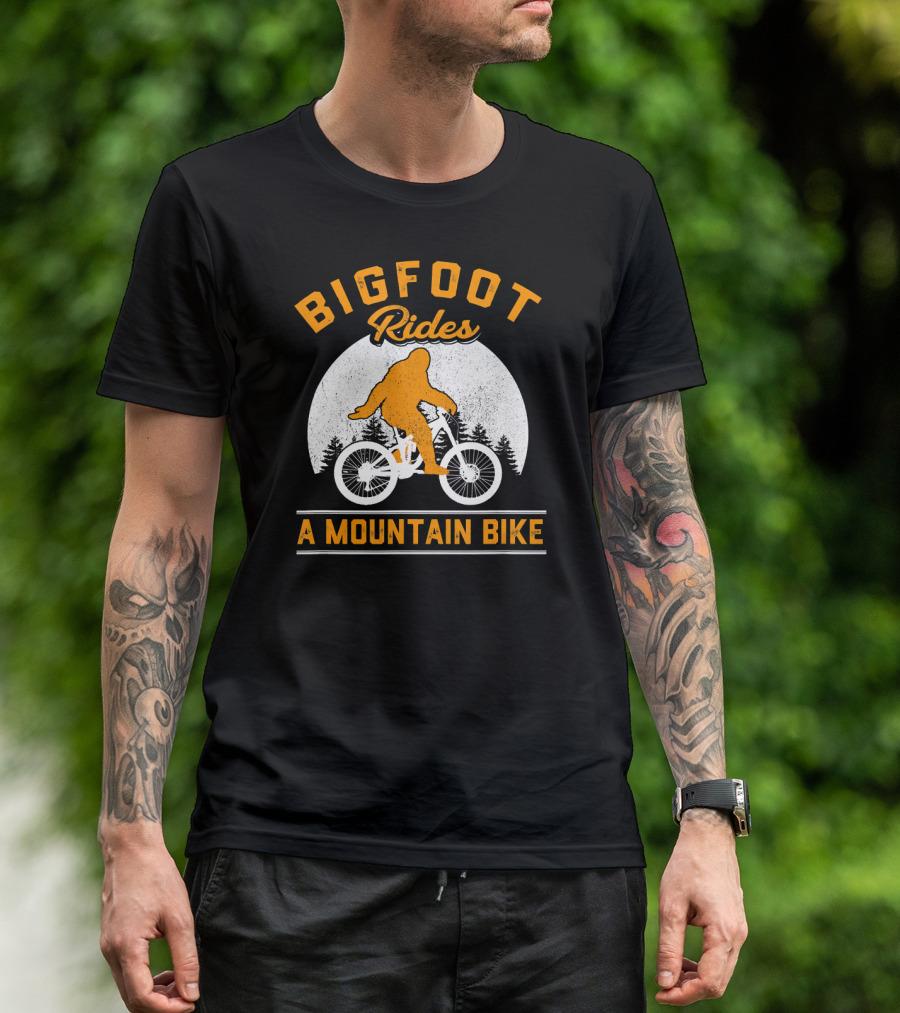 Bigfoot Rides A Mountain Bike In Forest Scene T-Shirt