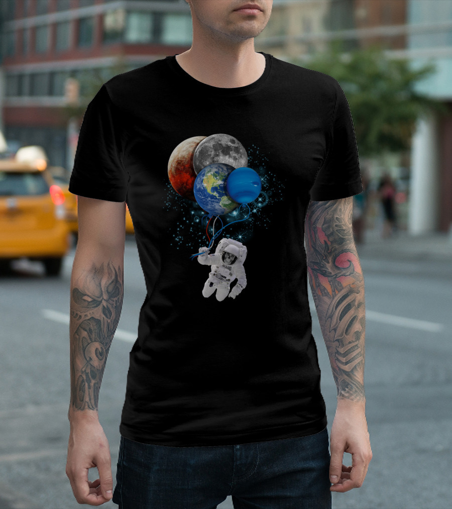 Astronaut Floating with Planet Balloons Including Earth, Moon, and Mars in Space Cosmic T-Shirt