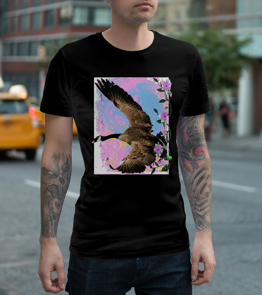 The Canada Goose Soaring Amidst Colorful Swirls and Purple Flowers T-Shirt