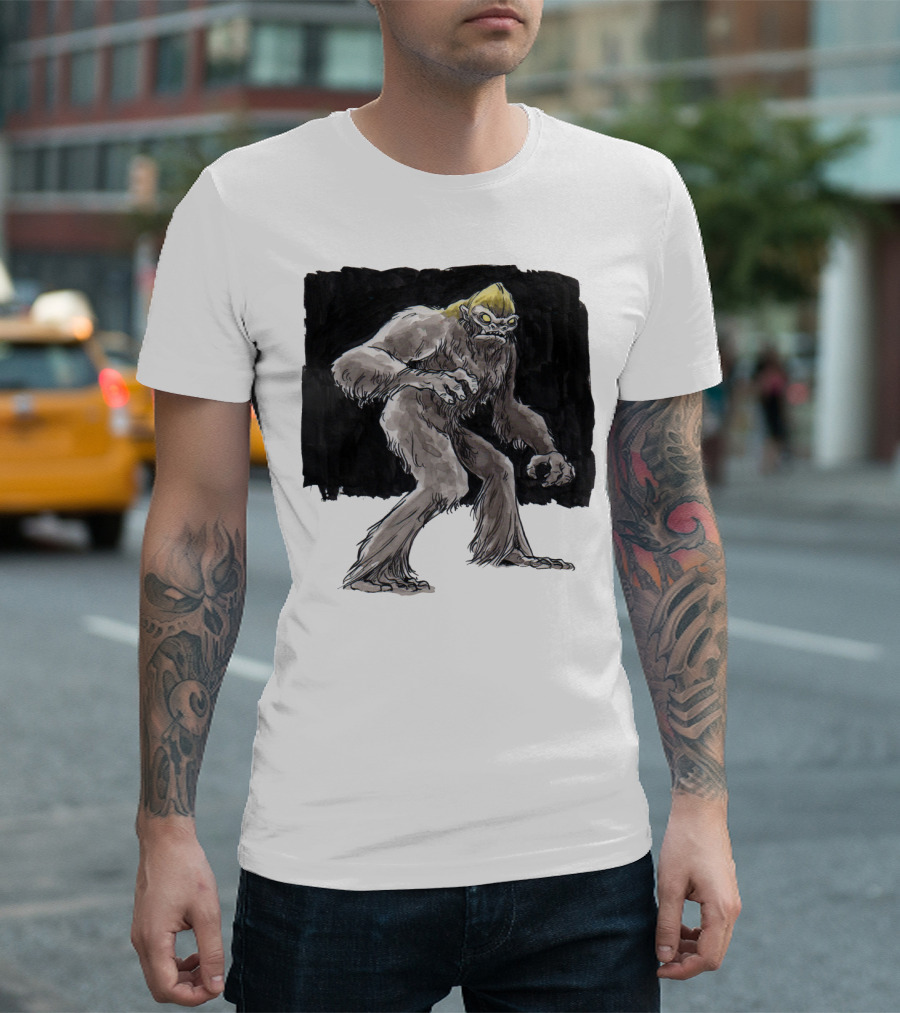 Old Yellow Top Bigfoot Creature with Yellow Hair in Dark Wilderness Scene T-Shirt