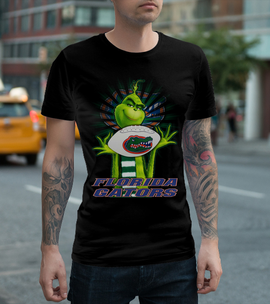 Grinch Holding Florida Gators Football T-Shirt
